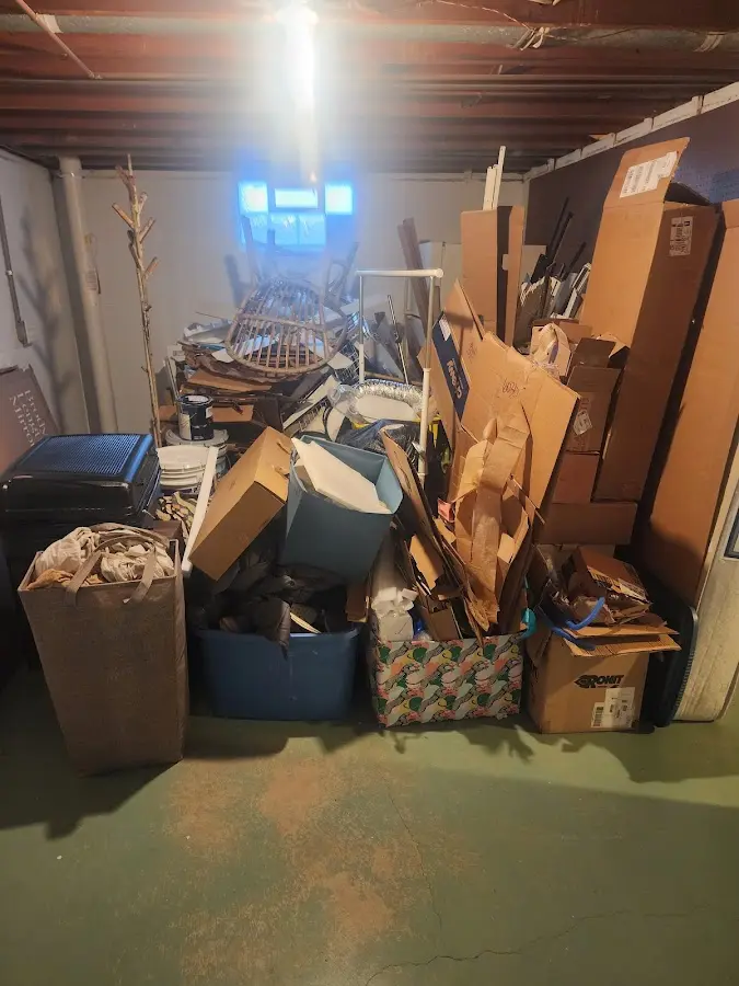 Roll-off dumpster container at job site for Roll Off Dumpster Rental in Hayden